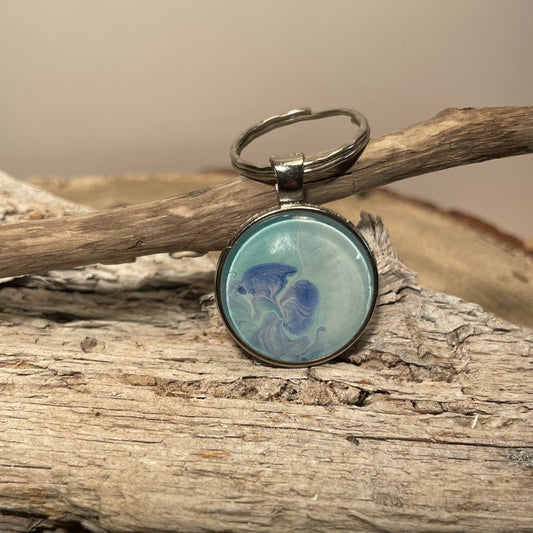 Keychain with glass cabochon