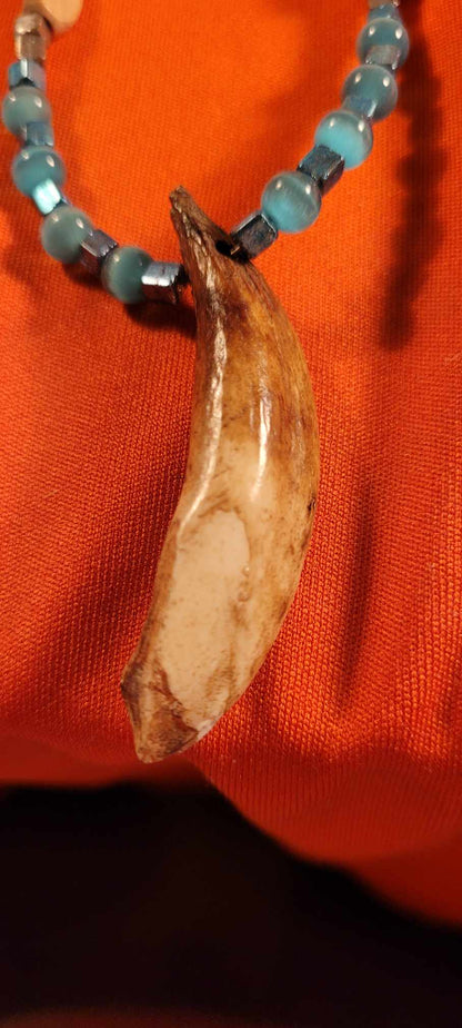 Necklace made of real camel tooth.