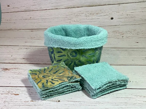 Set of reusable makeup remover wipes with basket