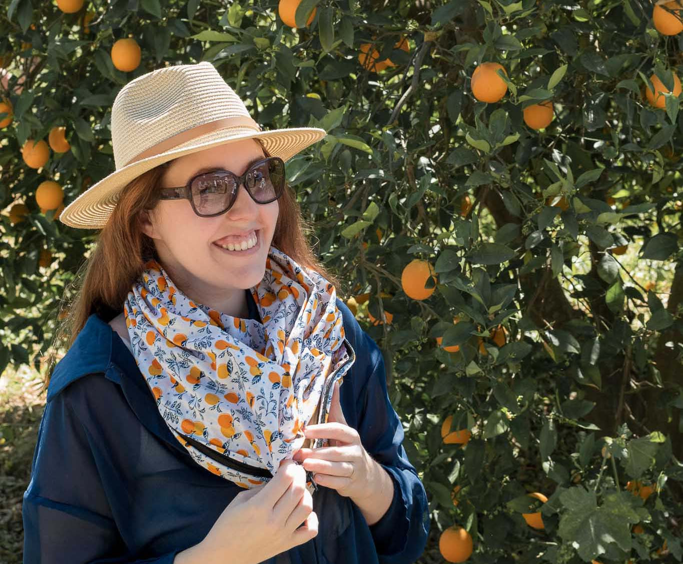 White scarf with orange motifs