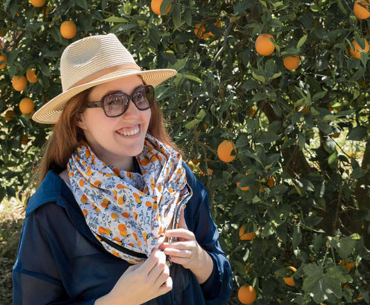 White scarf with orange motifs